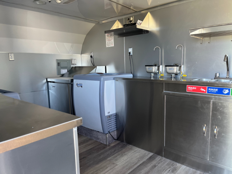 Inside a Professionally Built Dessert Camper Kitchen in Dessert Camper