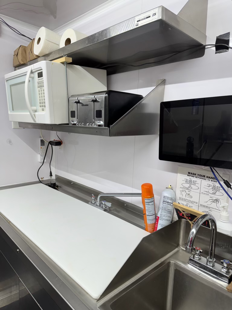 Sinks with Cutting Board Over Them Three Comp and Handwash